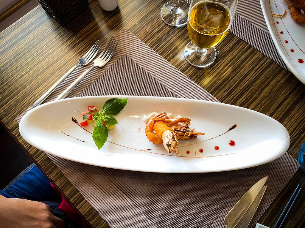 Savor fusion cuisine onboard